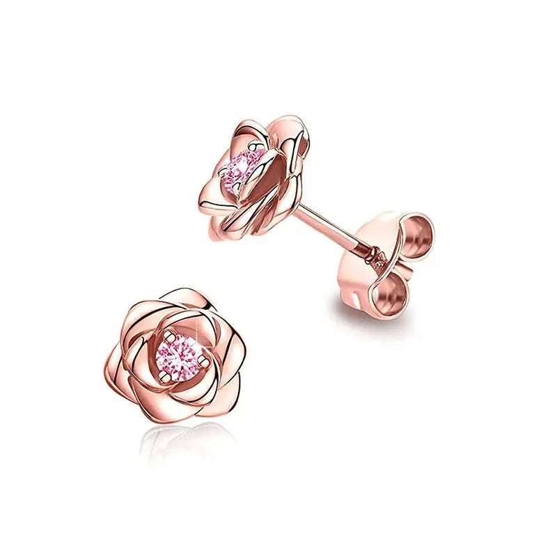 Rose gold flower stud earrings with pink cubic zirconia center stones; copper alloy fashion jewelry for women
