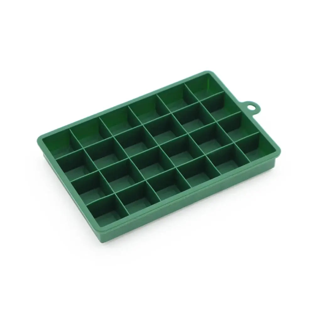Green silicone ice cube mold with 24 square cavities for freezing drinks