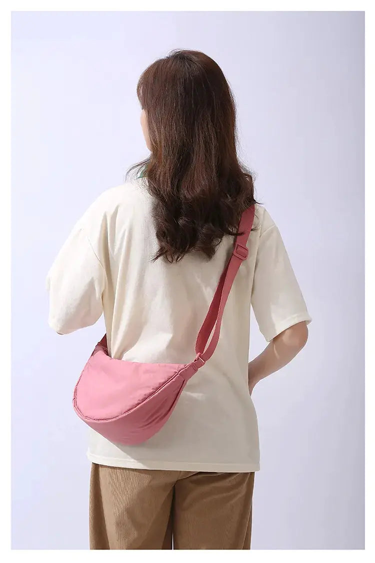 Simples Market pink nylon padded crossbody bag with adjustable strap