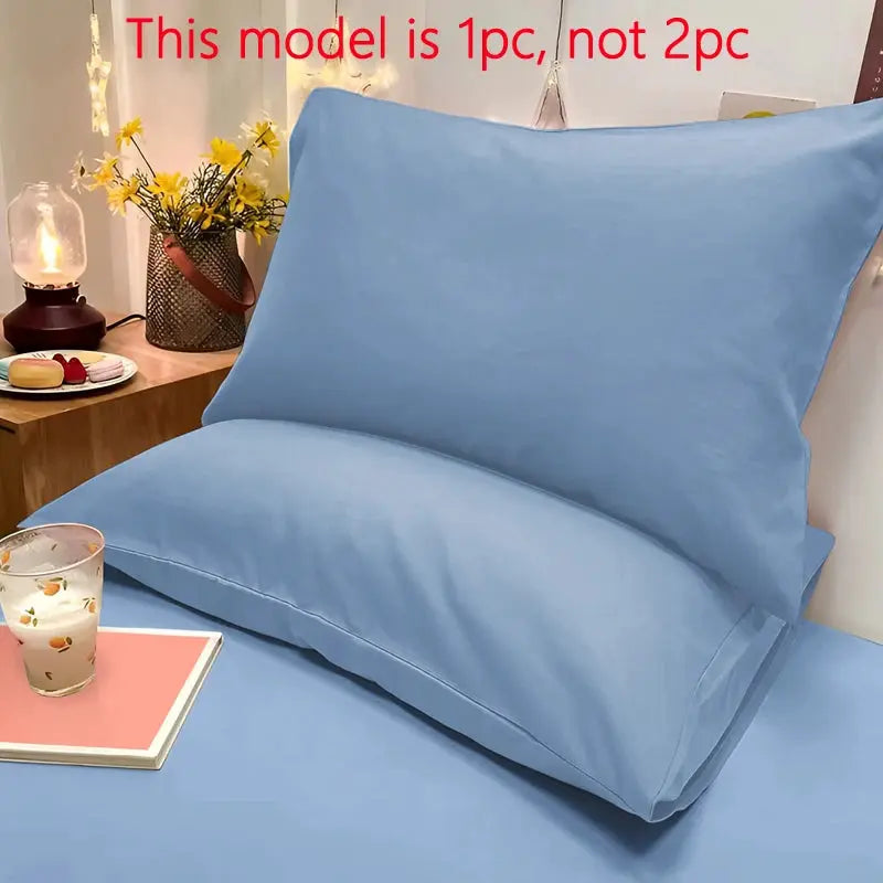 Pillowcase by Simples Market, 1-piece matte sky-blue solid color bedding accessory.
