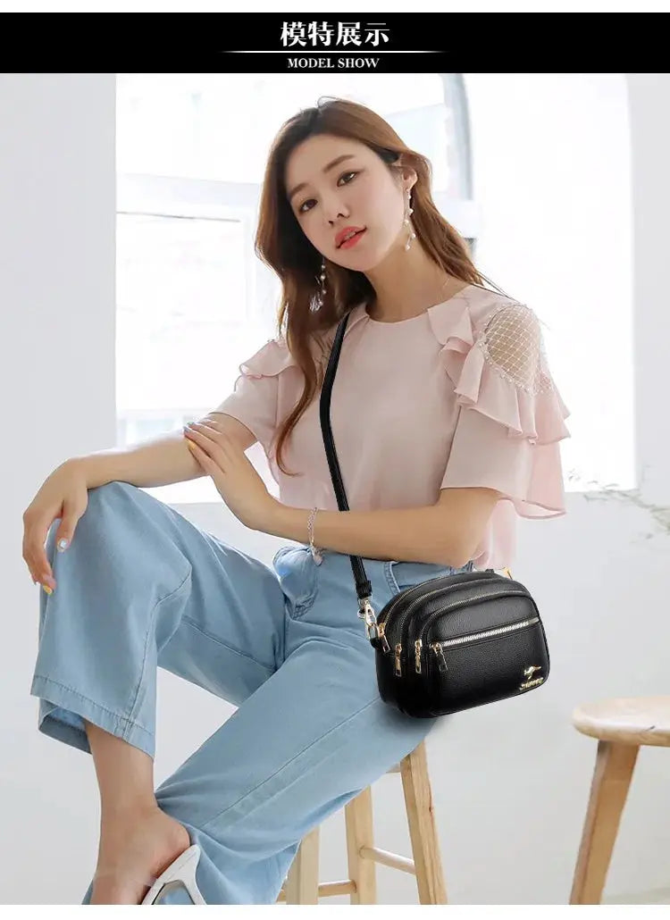 Soft leather purse Simples Market black crossbody bag with multiple zipper pockets