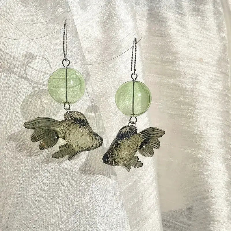 Pair of goldfish pendant drop earrings with translucent green beads