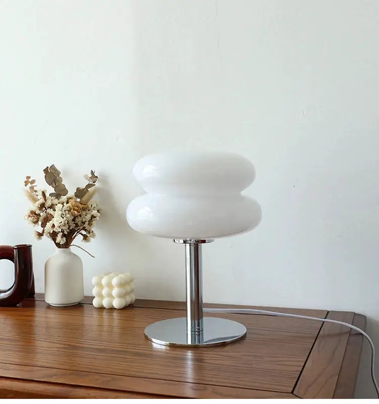 Macaron glass table lamp by Simples Market; white double-globe shade with chrome pedestal.