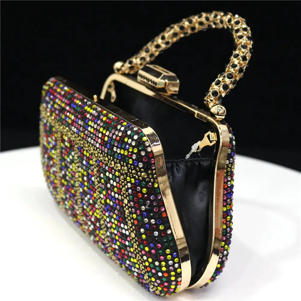 Rhinestone evening clutch with multicolor stones, gold-tone frame, and jeweled chain handle