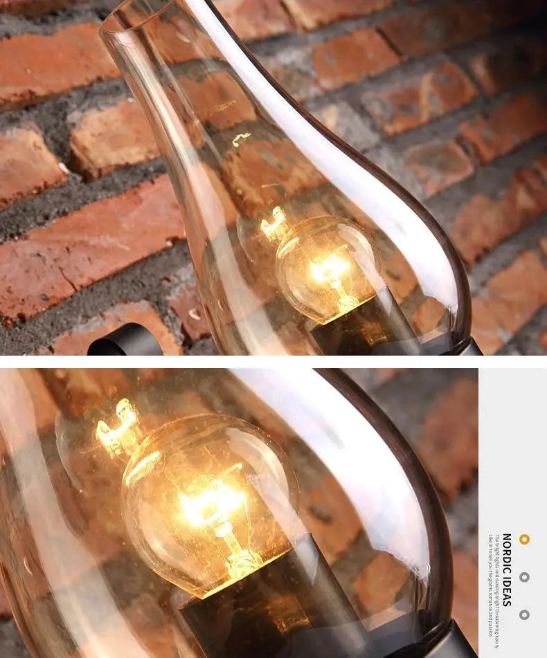Wall lamp with clear teardrop glass shade and exposed Edison bulb; industrial wrought-iron, Simples Market