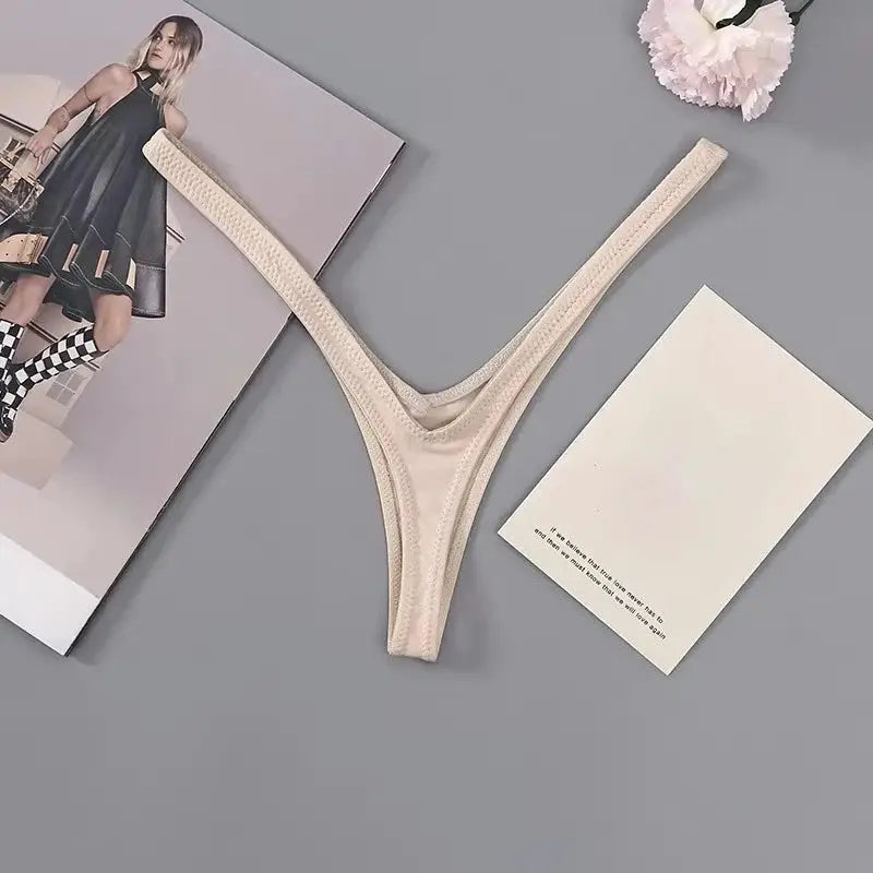 Thong underwear by Simples Market, nude color with deep V and soft thin straps.