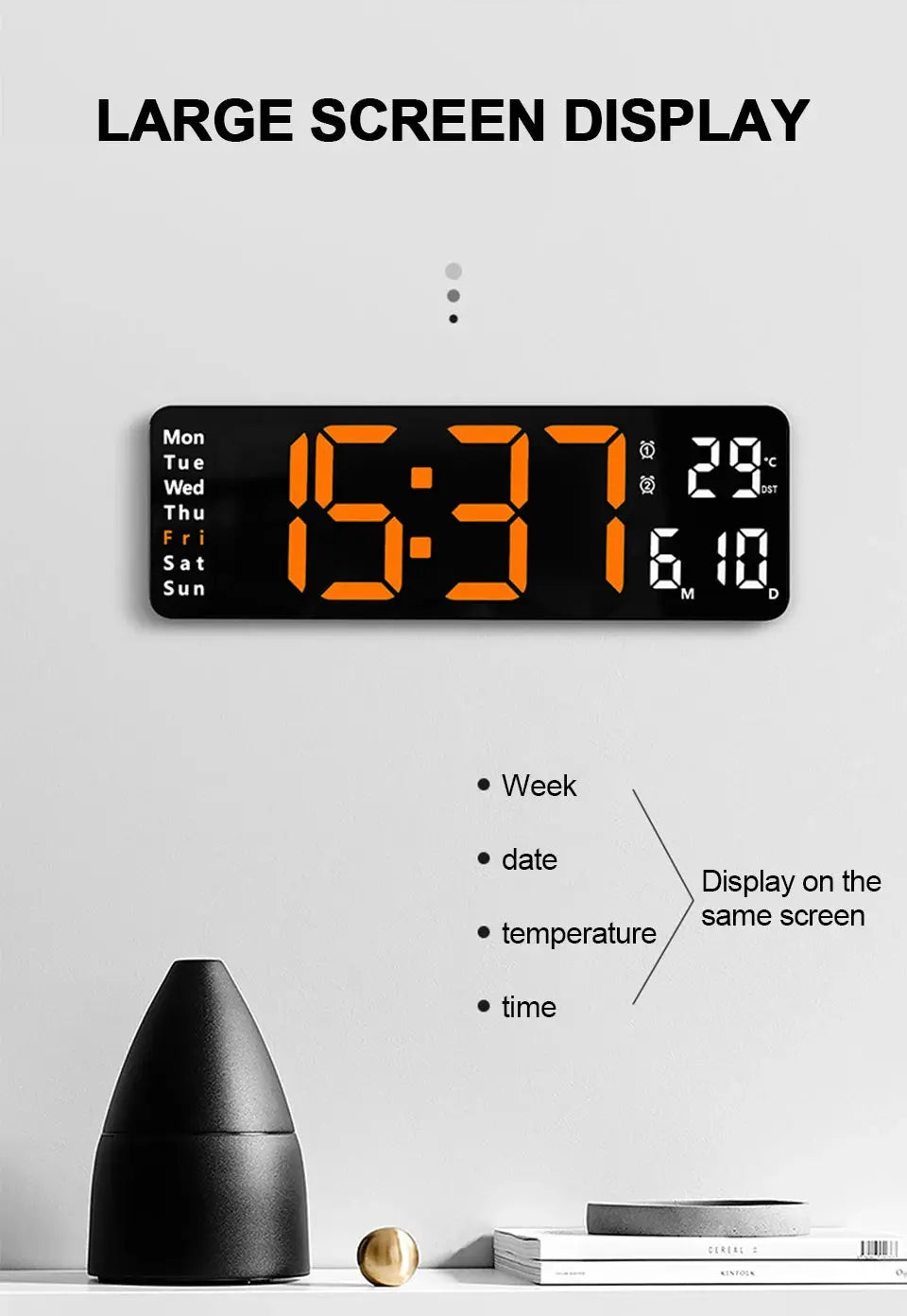 Simples Market large digital wall clock with orange LED on a black panel; weekdays on the left, time/date/temperature on the right.