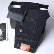 Men's straight denim jeans by Simples Market, dark indigo with back pocket stitching and leather patch