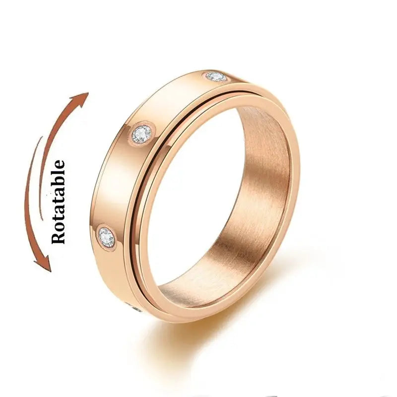 Rose gold stainless steel rotating knuckle ring with crystal accents