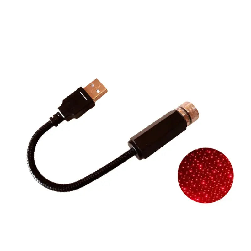 Car USB star projector night light; compact black module projecting a red starry pattern onto ceilings.