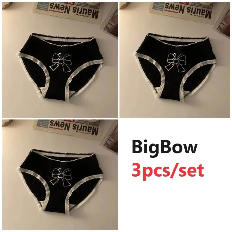 3-piece black cotton seamless panties set by Simples Market with white lace trim and bow design