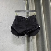 Simples Market women's black distressed denim shorts with frayed hems and zipper fly.
