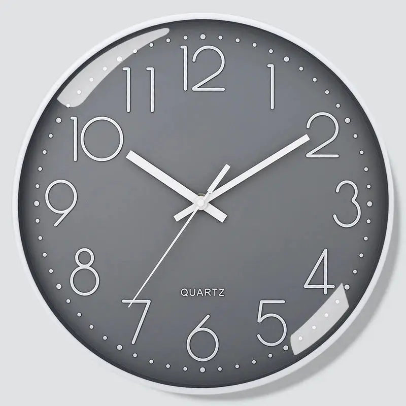 8 inch gray analog wall clock with white numerals and hands, white frame, quartz movement.