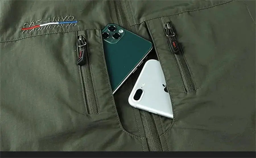 Sleeveless cargo vest by Simples Market, olive green with front zip pockets; 2 smartphones in chest pockets
