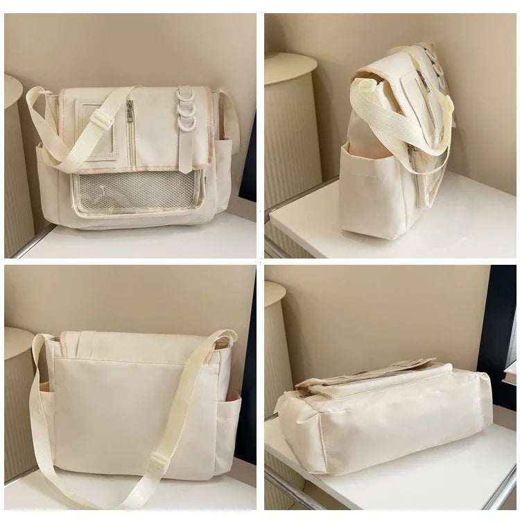 Itabag shoulder bag in cream with front pocket, mesh panel, and adjustable strap