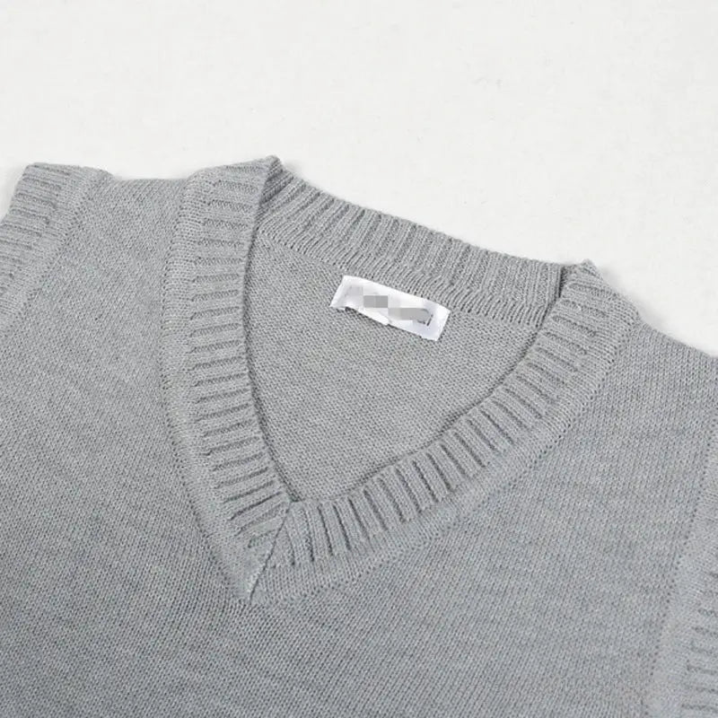 Men's gray knitted sweater vest with V-neck, thick ribbed knit