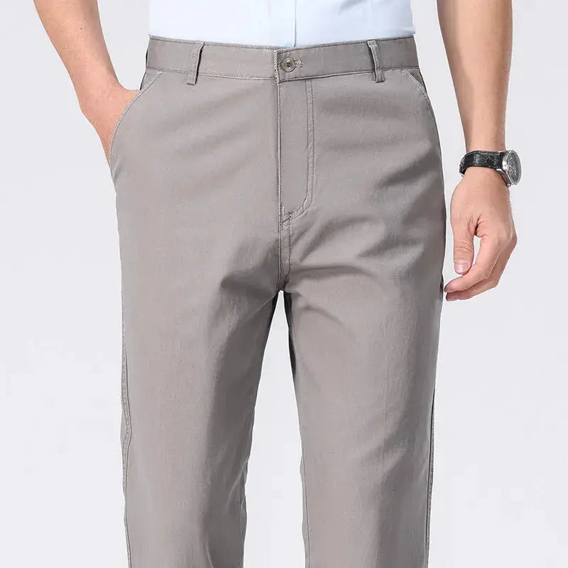 Men's gray chinos with pockets, lightweight business casual dress pants.