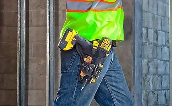 Power Tool Holster for cordless drills; black and yellow holster with metal clip on a work belt.
