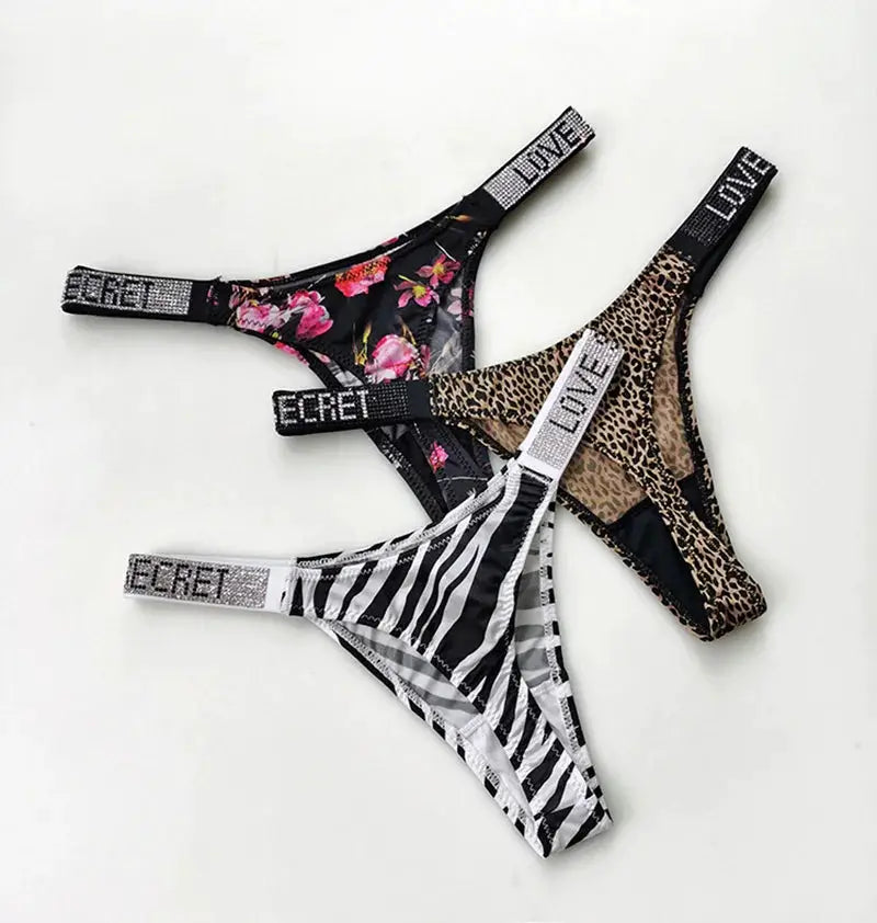 5-piece low-rise thong underwear set in floral, leopard, and zebra prints with rhinestone waistbands