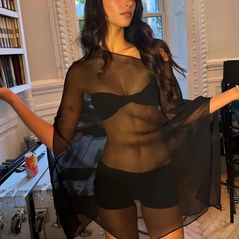 See-through chiffon blouse for women in black; sheer cover-up over bralette.