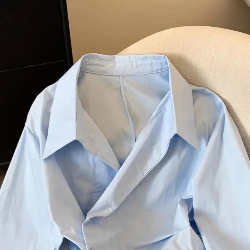 Light blue long-sleeve blouse with oversized collar for women, workwear top