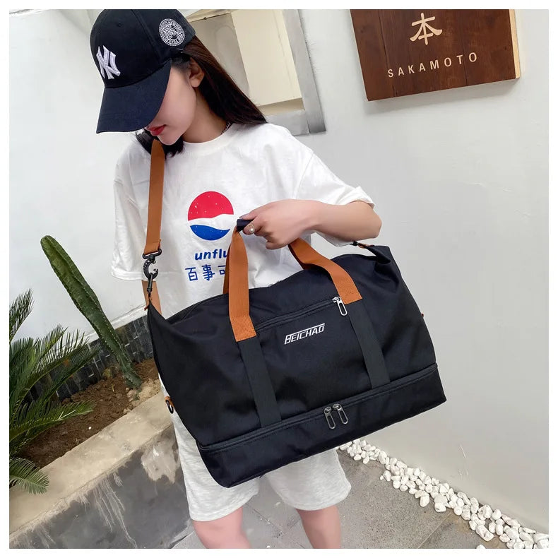 Large-capacity gym bag BEICHAO, black with brown top handles and adjustable shoulder strap.