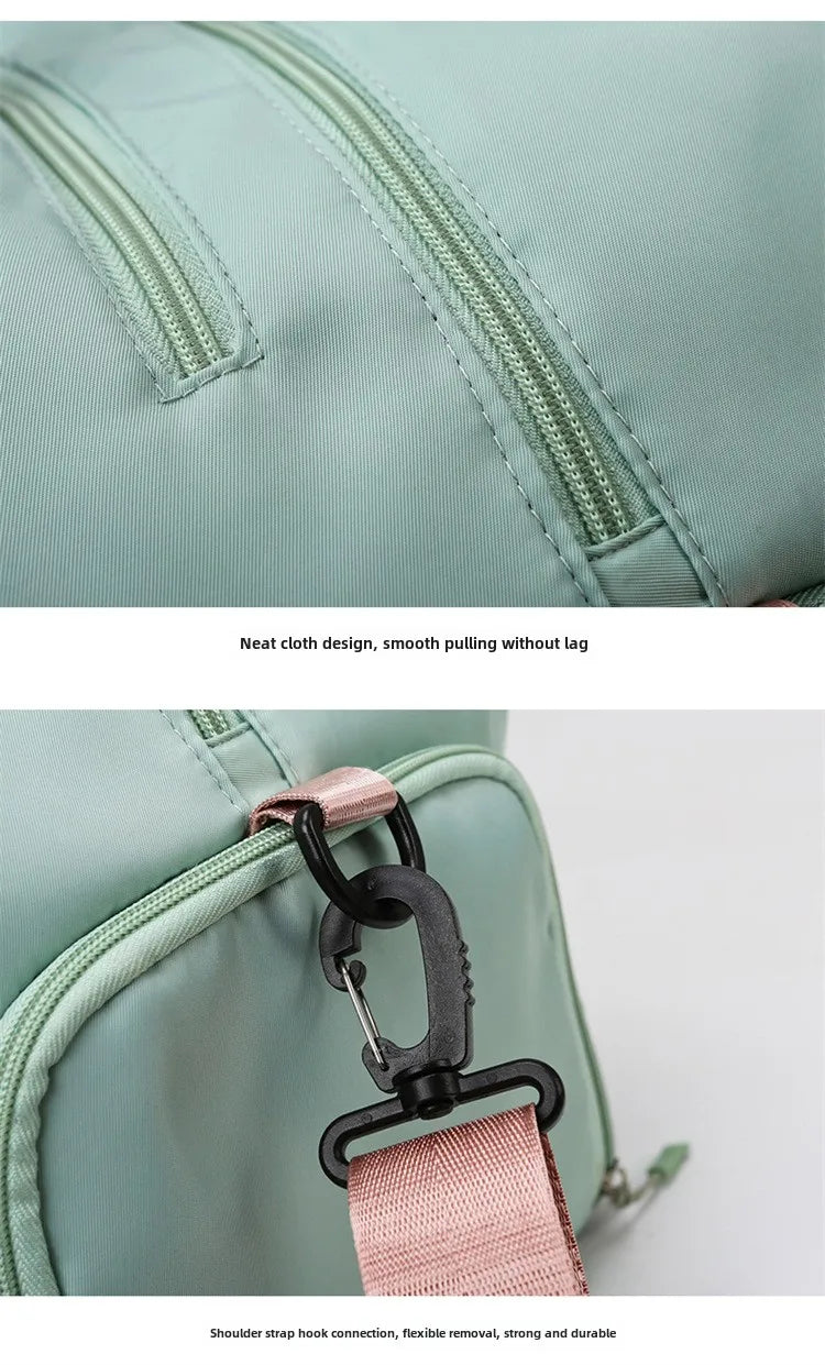 Fitness bag in mint green with dual zippers and pink shoulder-strap hook.