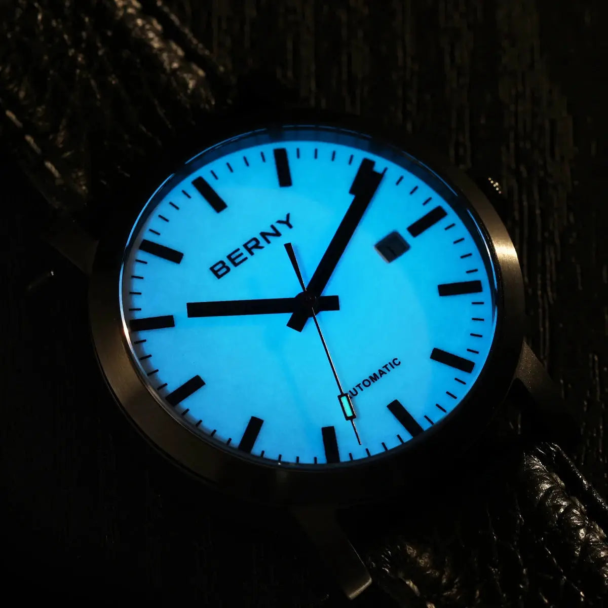 BERNY Watch for Men, automatic self-wind with blue luminous dial, date window and black markers.