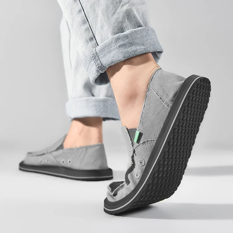 Men's canvas casual loafers in grey by Simples Market with breathable low-top design and black sole