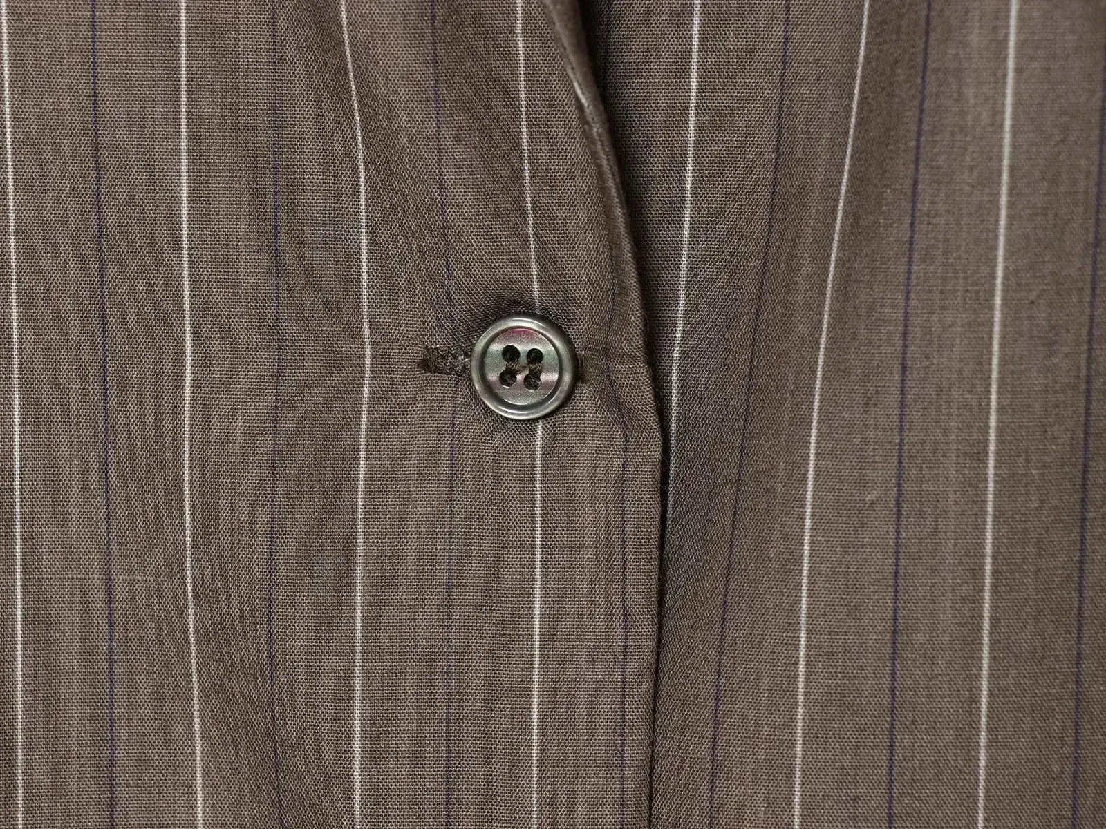 KONDALA brown pinstriped single-breasted blazer with button detail.