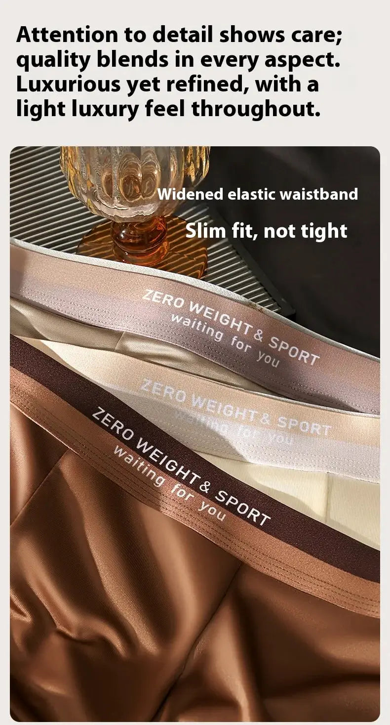 Men's ice silk boxer shorts with a wide elastic waistband in neutral tones; breathable plus-size underwear