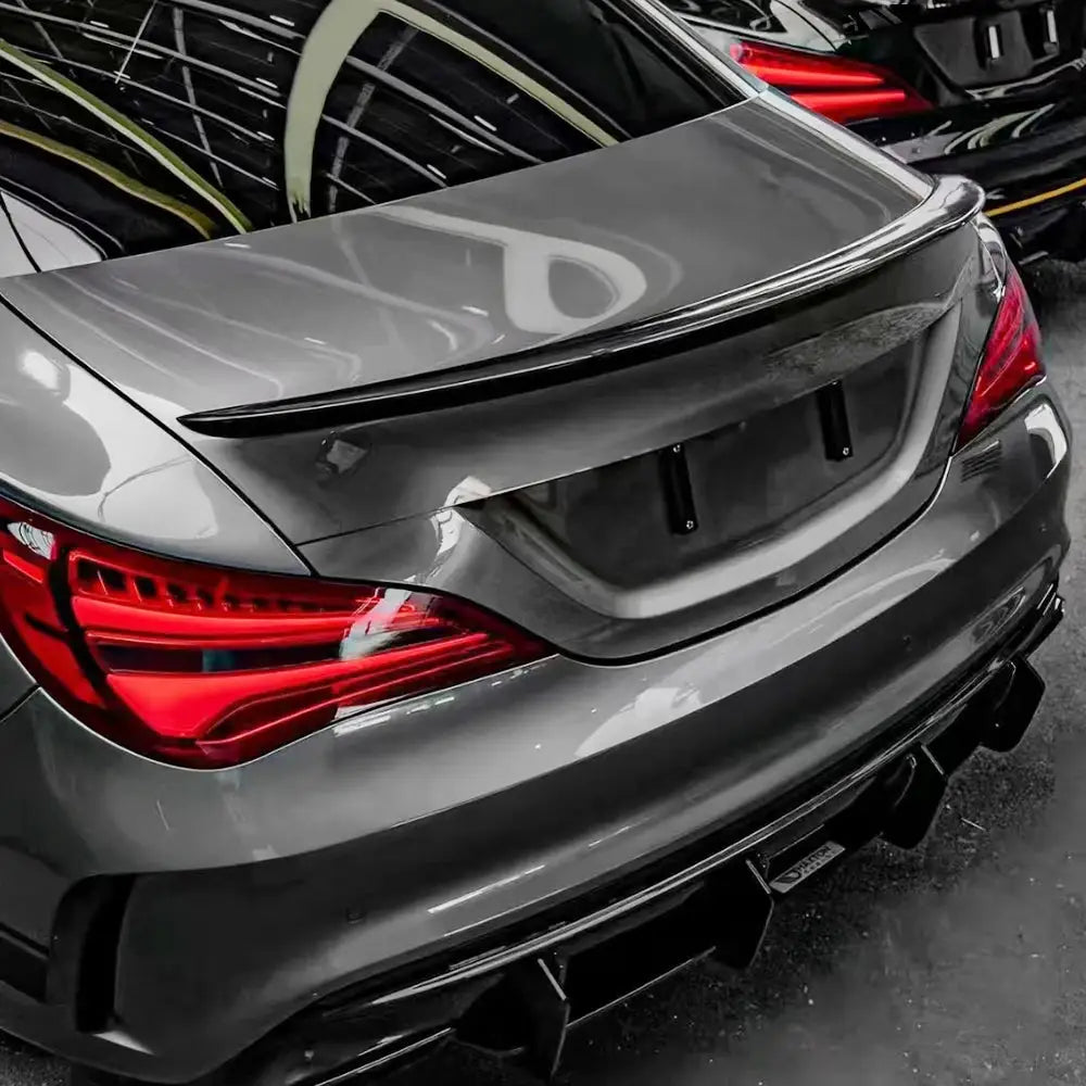 Car spoiler trunk wing accessory in black carbon fiber finish with universal fit