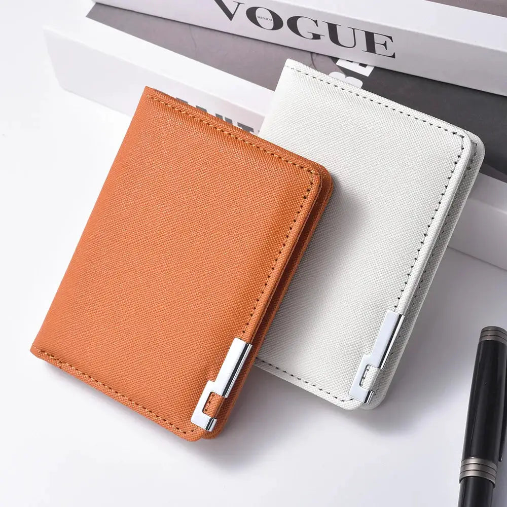 Two slim faux leather business-style wallets, brown and gray, with metal clasps.