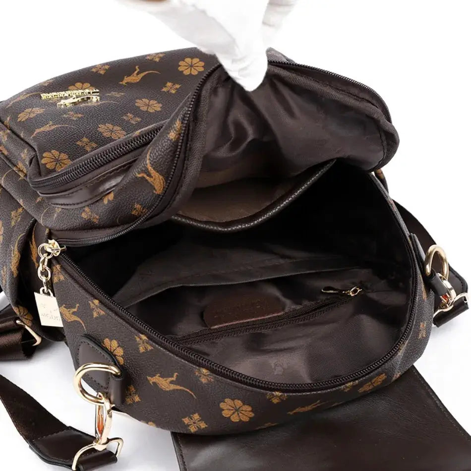 Ladies leather backpack by Simples Market, brown with gold floral print, large-capacity main compartment.