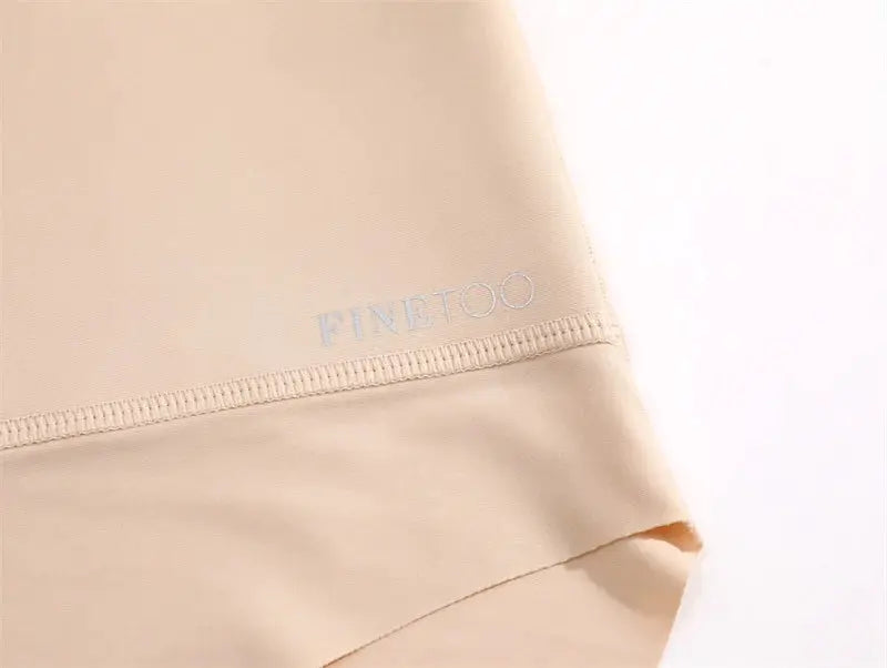 Large-size seamless high-waist panties shapewear in beige ice silk with FINETOO logo