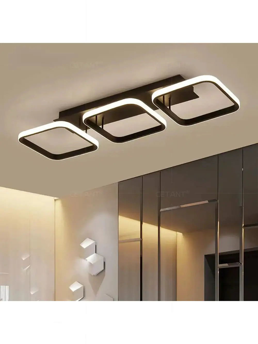 LED ceiling light by Simples Market; triple square-ring design with black frames and integrated LEDs.