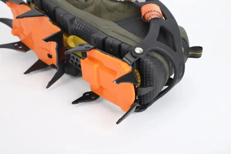 12-tooth ice crampons pair by Simples Market with orange housings and stainless steel spikes