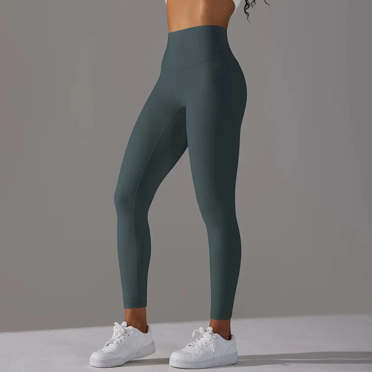 High-waist Naked Feeling leggings in teal for women; fitness yoga pants.