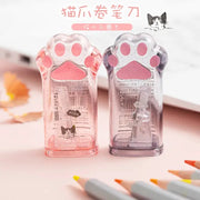 Cat paw pencil sharpeners, pink and purple translucent plastic, Simples Market 2-pack.