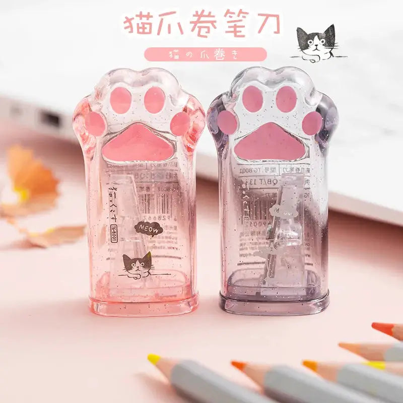 Cat paw pencil sharpeners, pink and purple translucent plastic, Simples Market 2-pack.