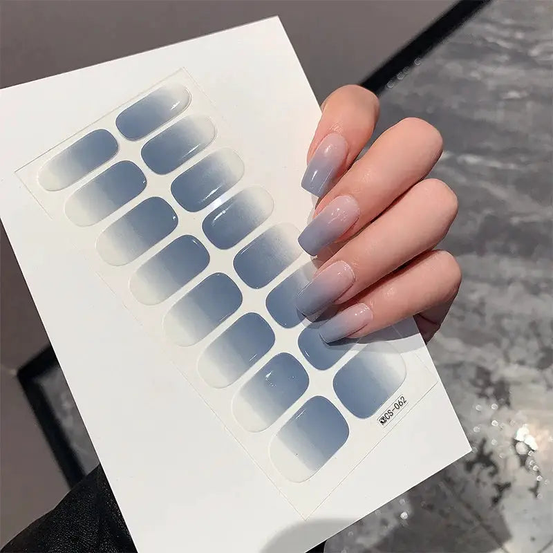 Nail decal sheet with 14 full-cover blue-to-white gradient stickers by Simples Market