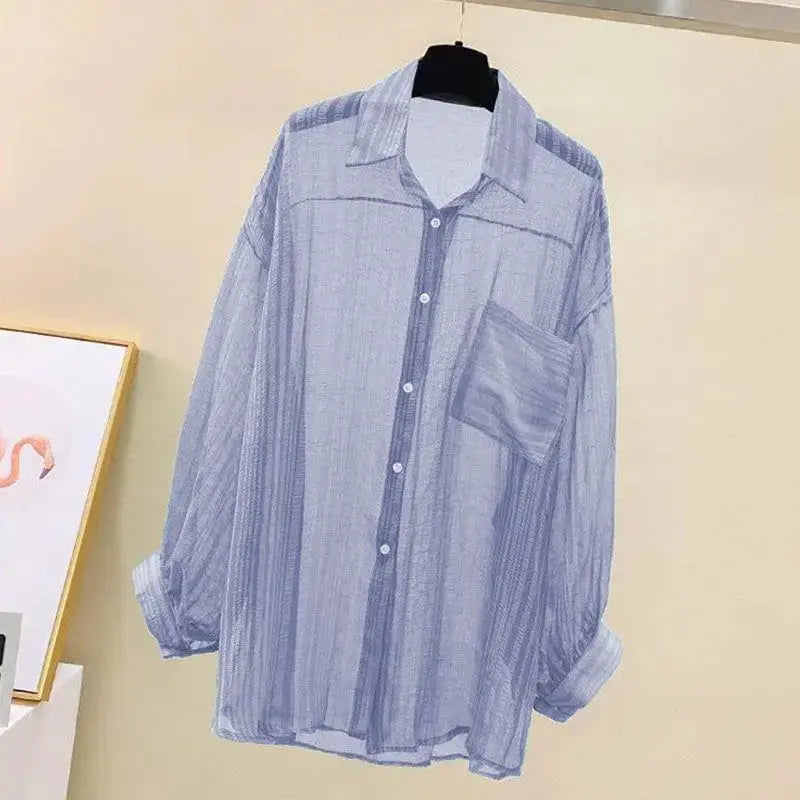 Blue striped chiffon blouse top by Simples Market, loose see-through style with front buttons and chest pocket.