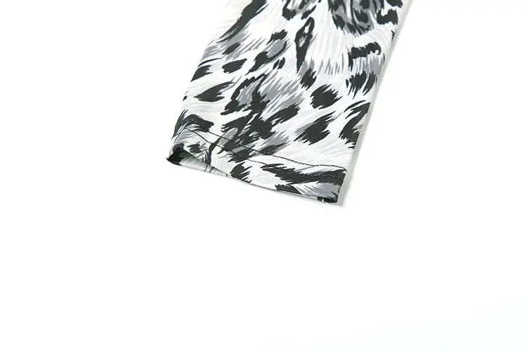 Leopard print jumpsuit sleeve in black and white pattern