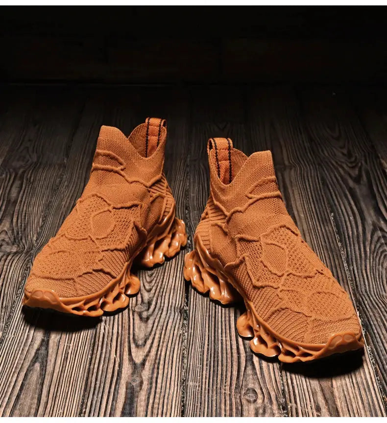 Pair of men's brown knitted sneakers with a sculpted orange sole, breathable casual running shoes