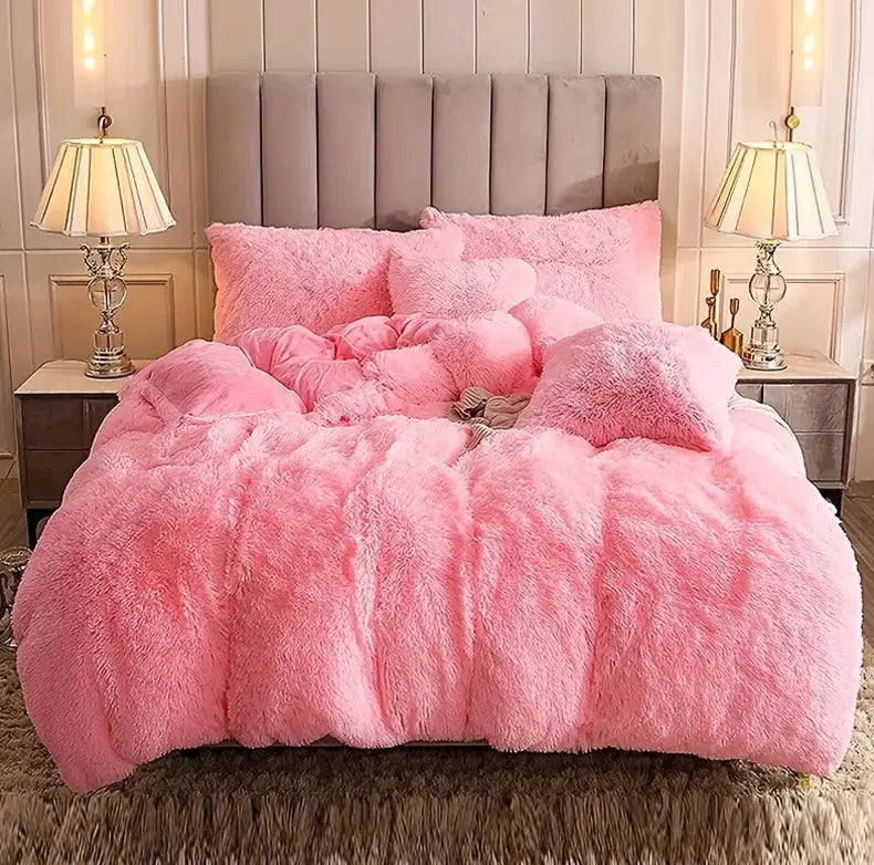 3-piece pink plush duvet cover set with fluffy texture on bed
