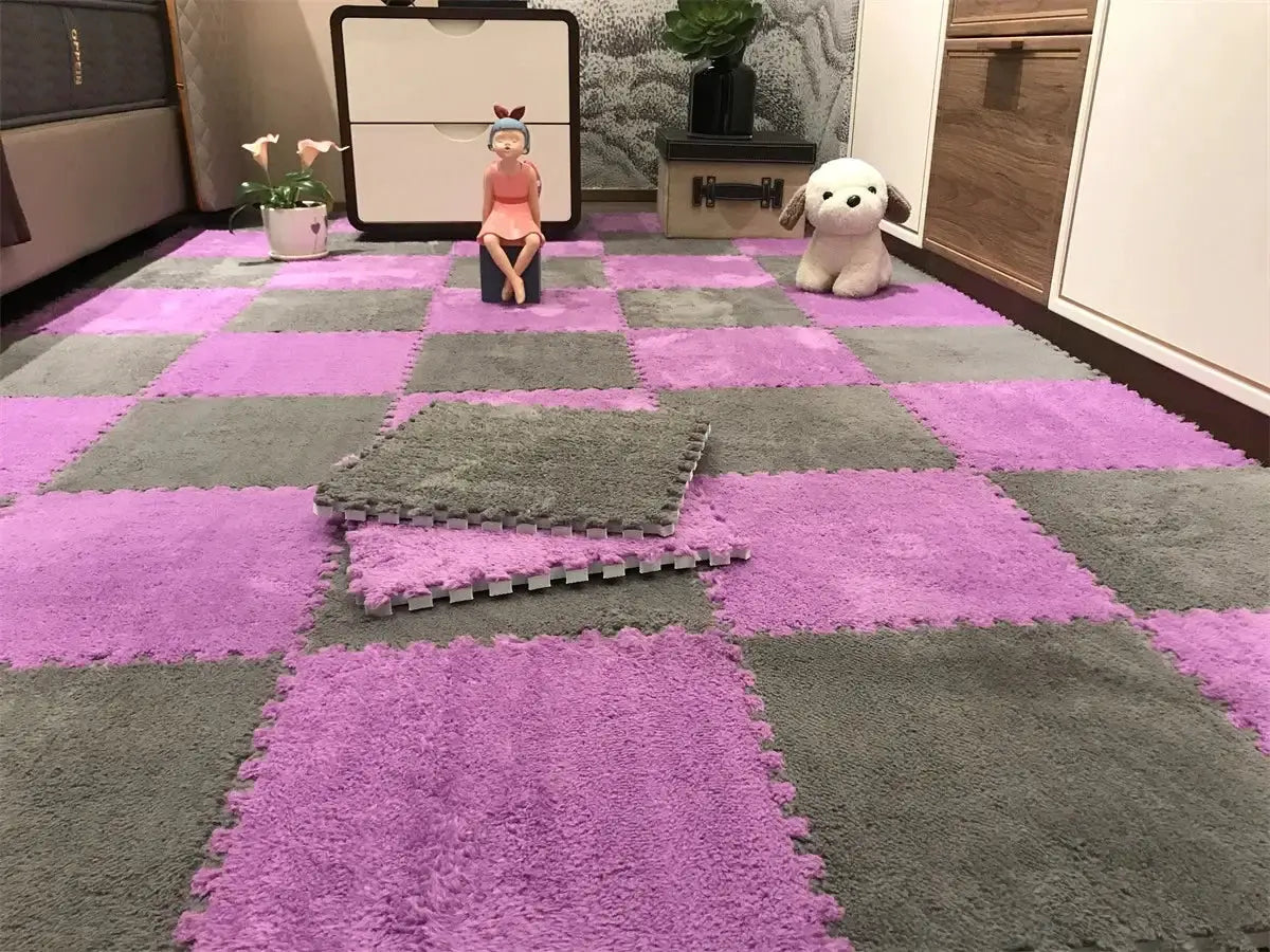 Soft plush EVA foam puzzle mat for kids, pink and gray interlocking tiles by Simples Market.
