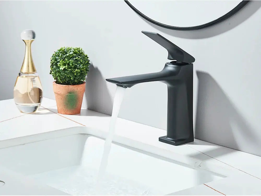Black deck-mounted bathroom sink mixer faucet with single lever by Simples Market.