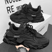 Men's black thick-soled sneakers; two pairs shown with breathable mesh.