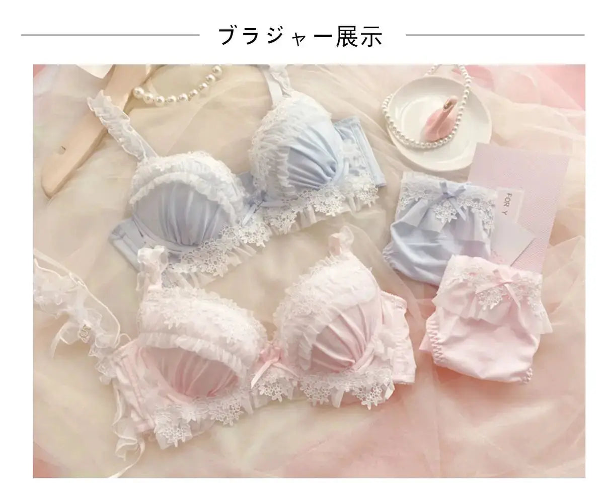 Pastel lace lingerie set: blue and pink padded bras with white floral trim and matching panties (4-piece set)