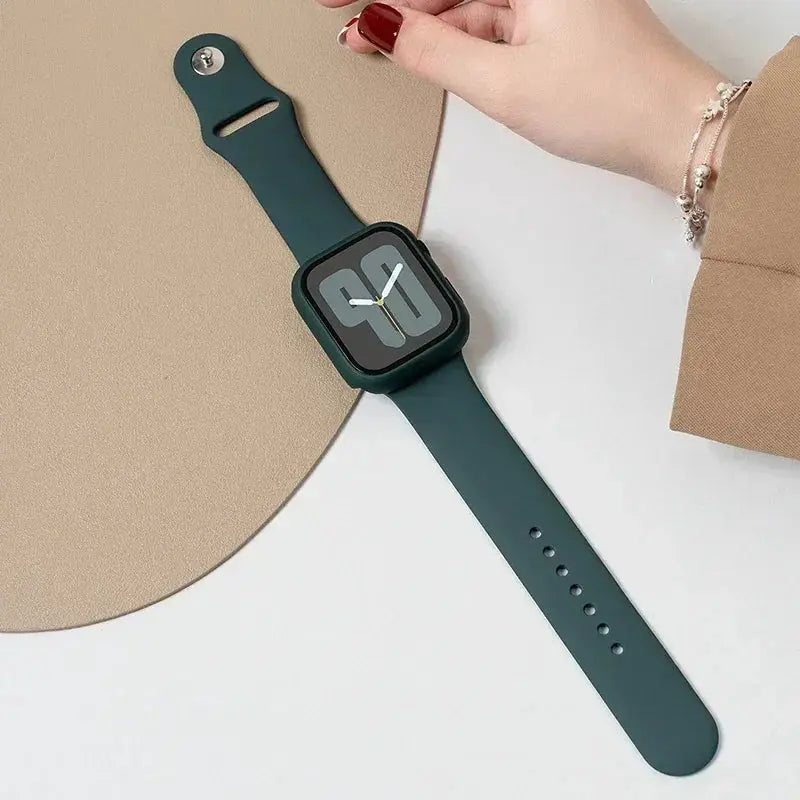 Apple Watch tempered glass+case with dark green silicone band, fits 38–46mm.